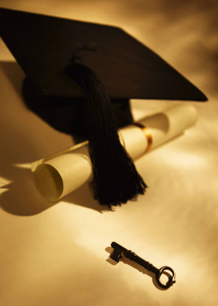 graduation cap and key