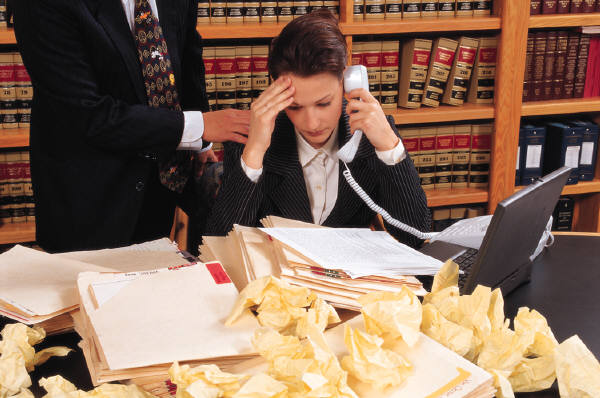 frustrated woman taking a phone inquiry