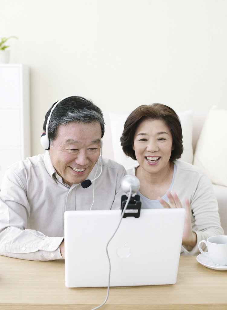 Older Couple Using Webcam