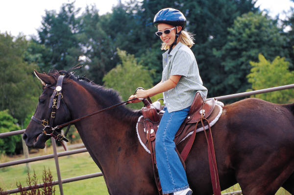 woman riding a horse