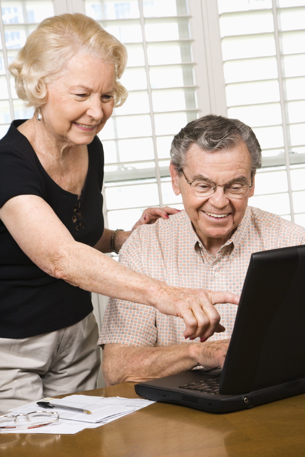 Mature couple with laptop