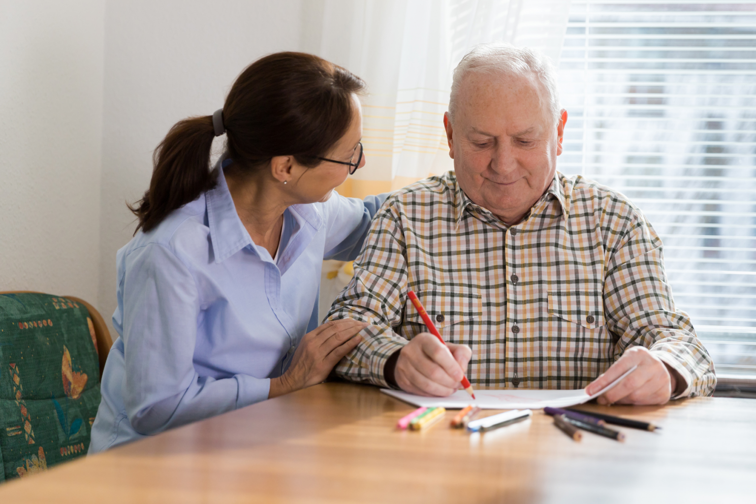 woman taking care of a loved one diagnosed with dementia