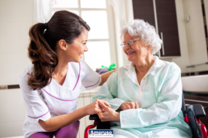 Nurse attending senior woman in a long term care facility, concept of trust between medical staff and home occupants