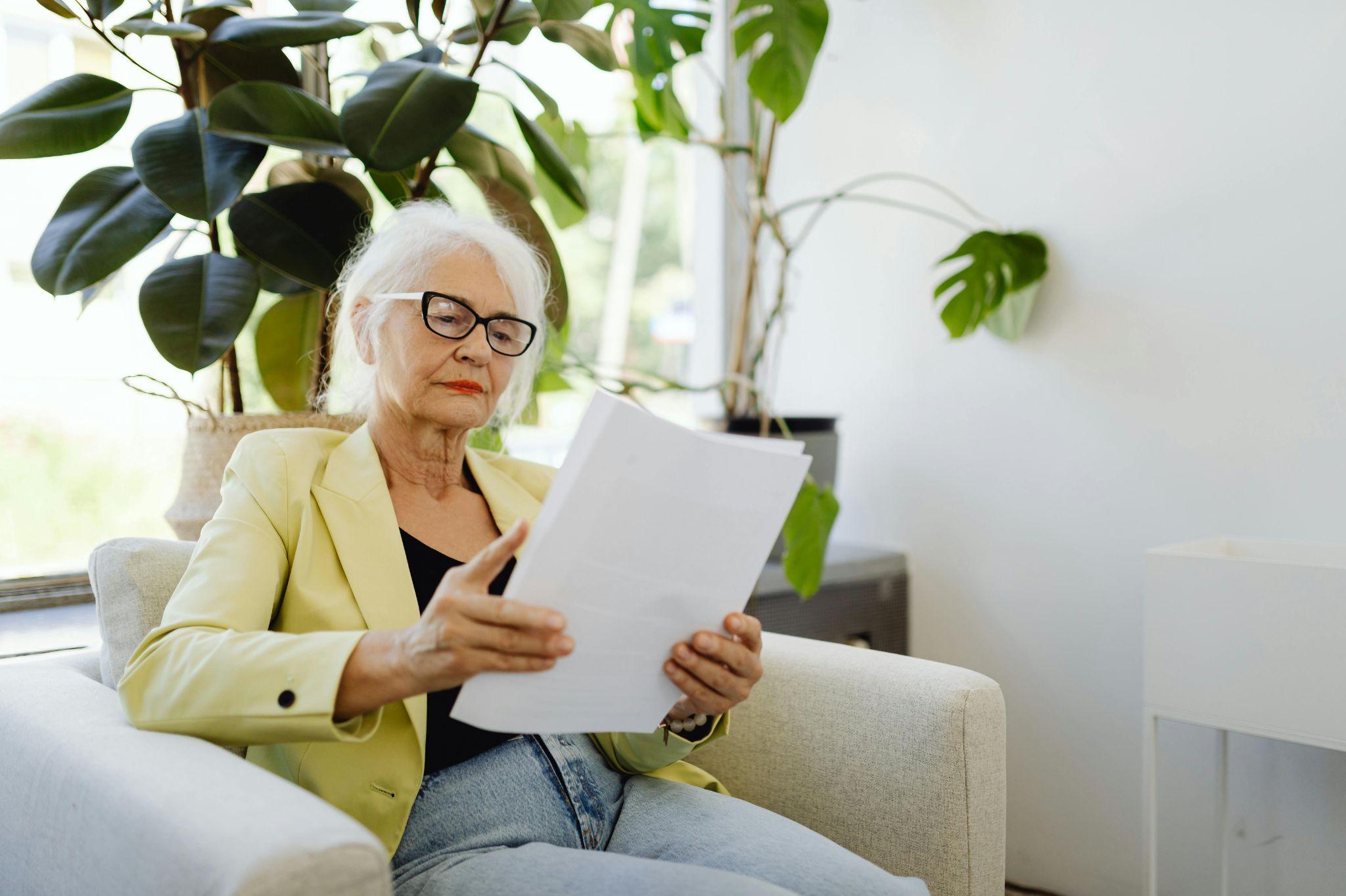 Attorney discussing Medicaid planning options with family reviewing documents